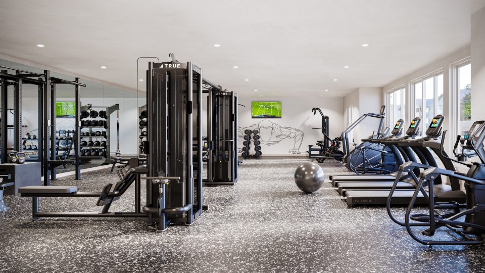 a gym room with equipment and mirrors at The  Preserve at Sycamore Creek